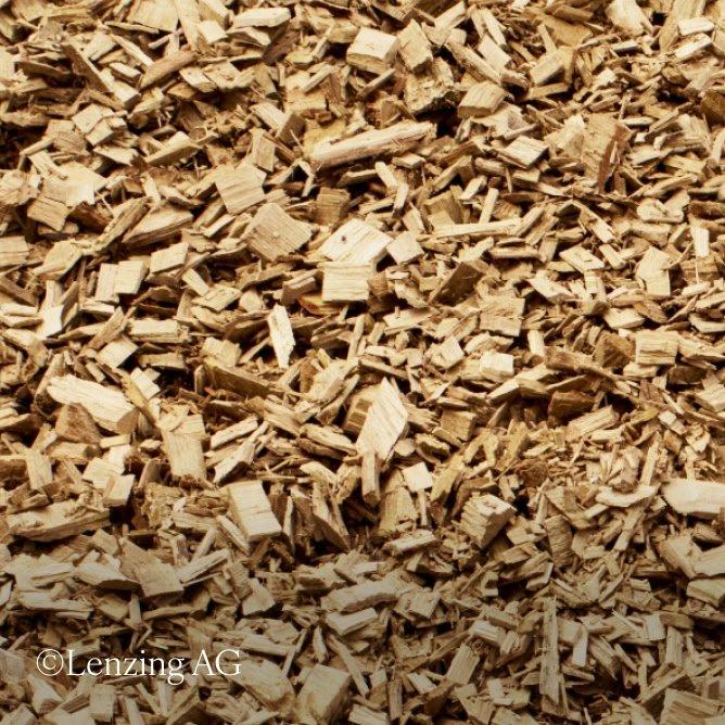a pile of wood chips is shown in this photo
